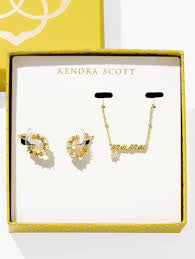 This Kendra Scott gift set features a Mama" script necklace and crystal huggie earrings