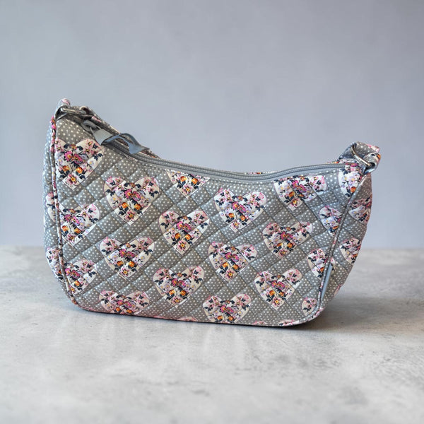 Vera Bradley Cotton Frannie Crescent
Crossbody Bag in the Mon Amour Gray print.